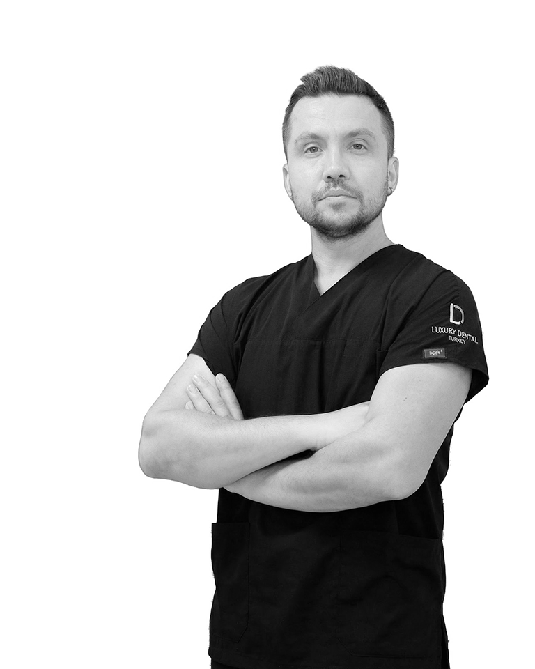Dt. Murat Demiral, cosmetic dentist specialising in implantology at Luxury Dental