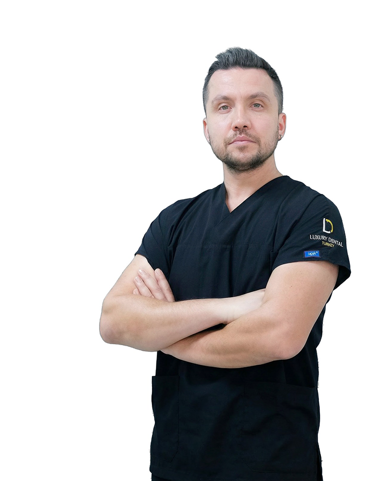 Dt. Murat Demiral, cosmetic dentist specialising in implantology at Luxury Dental